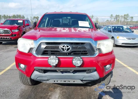 2014 Toyota Tacoma Base V6 z USA, uszkodzony, nr VIN 3TMLU4EN6EM136277